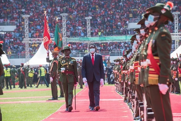 President Hakainde Hichilema inspects the guard of honour during his inauguration